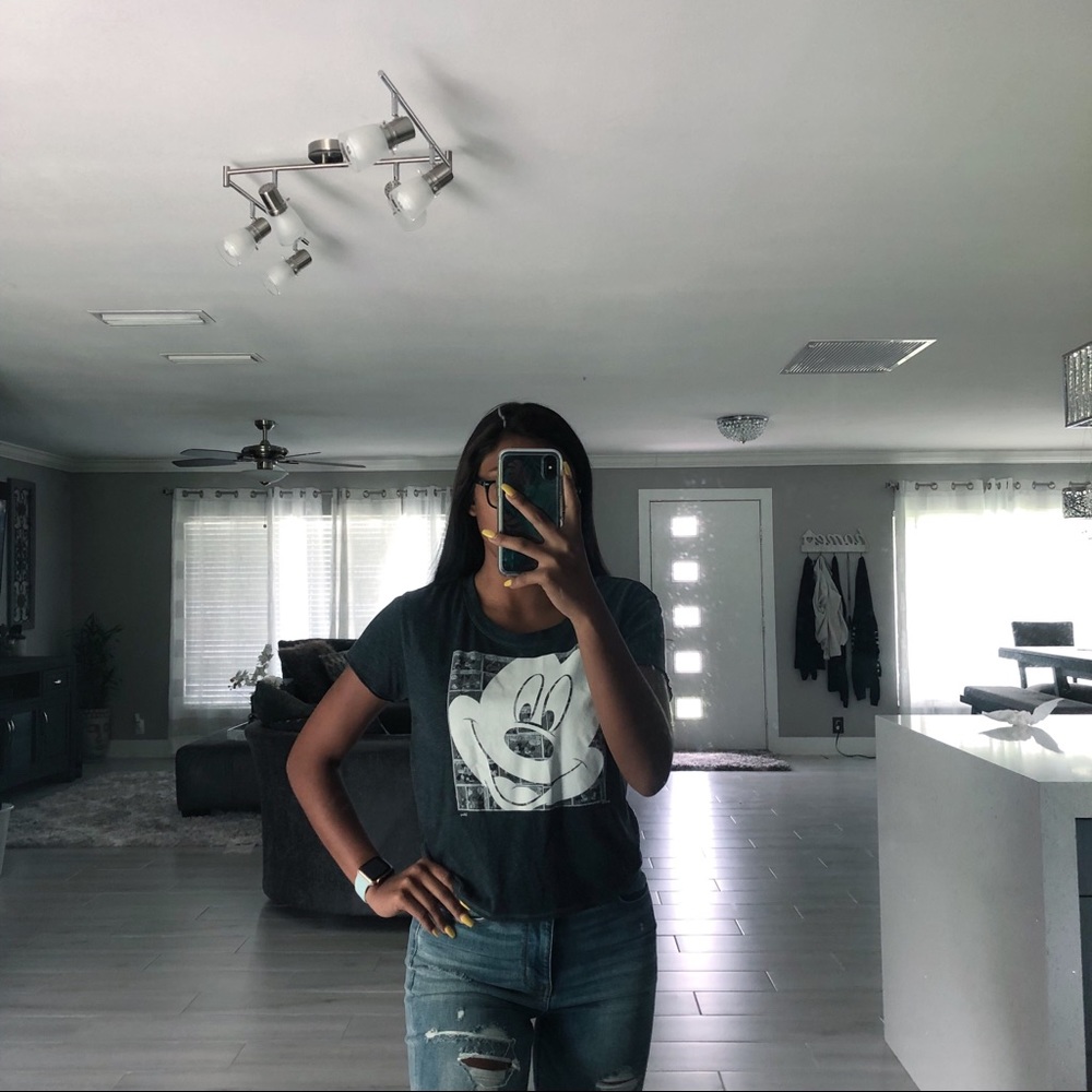 Mickey Mouse shirt.